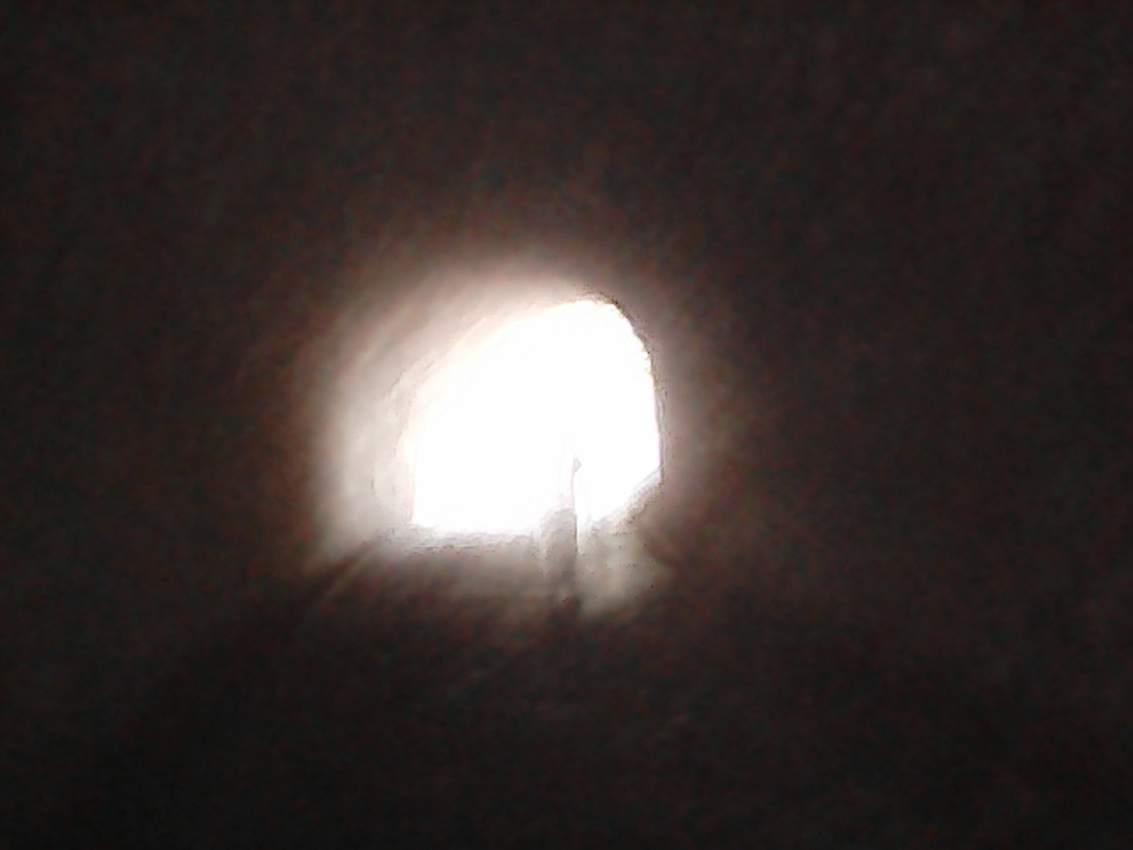 A blurry image of a tunnel.
