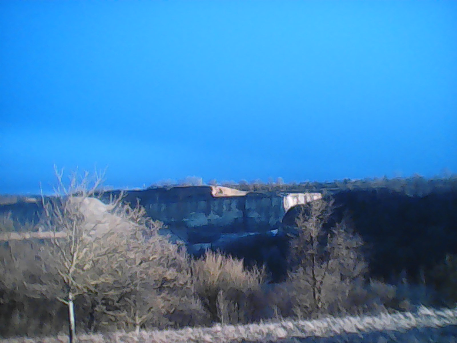 A quary under a deep blue sky.